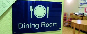 Dementia dining room signage with plate graphic