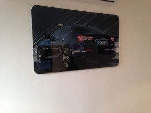 Acrylic signage graphic with car