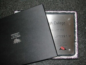 UClan boxed plaque close up