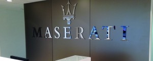 Alt view of Maserati reception with flat cut letters