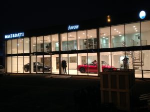 Maserati night time with cars