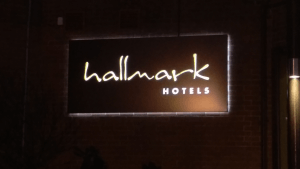 Alternative Hallmark Hotels logo on black - back lit