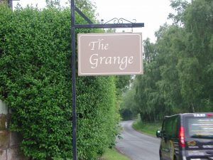 The Grange Projecting Sign