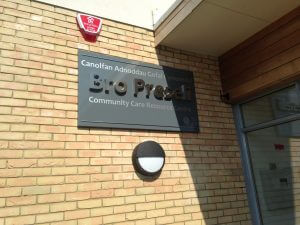 Wall Mounted Sign with Built Up Stainless Steel Letters