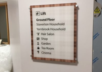 dementia friendly signage next to lift