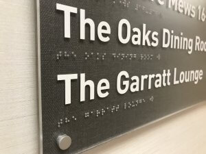 Care home sign with braille