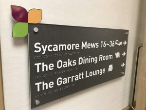 Directional sign with braille